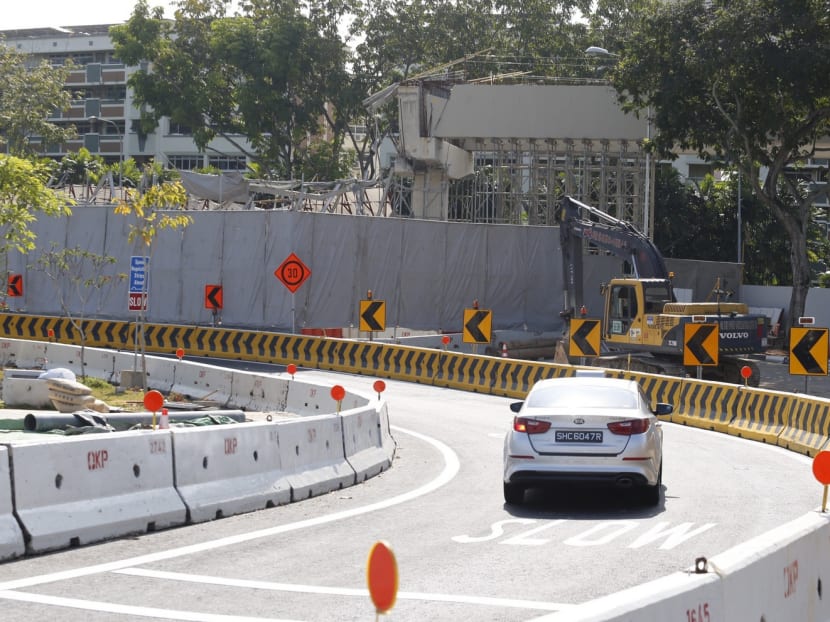 A car entering the slip road next to the collapsed viaduct at Tampines, near the Pan-Island Expressway exit to Tampines Expressway. Photo: Najeer Yusof