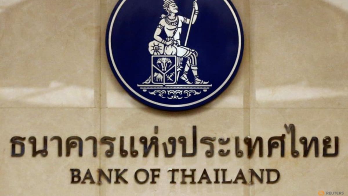 Thai central bank raises key rate, trims growth outlook on global slowdown