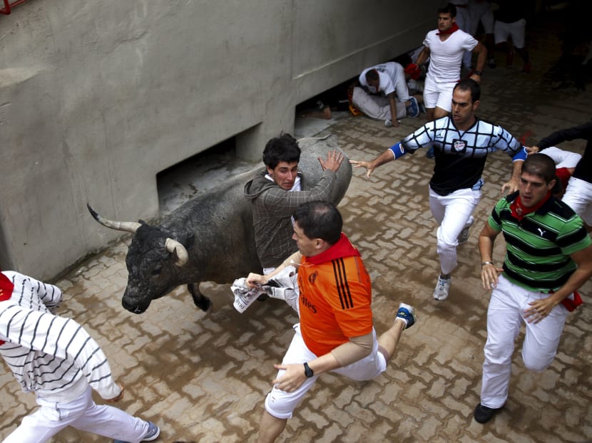 4 people gored in Spain's 5th Pamplona running of the bulls, News
