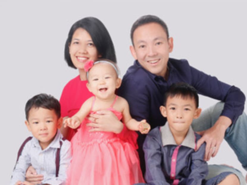 The writer, seen here with his family, said that he fussed over his first two children when they were born and neglected his wife. The writer, seen here with his family, said that he fussed over his first two children when they were born and neglected his wife.
