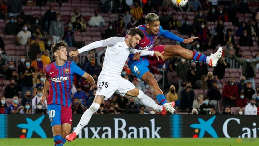 Football: Barca scrape late draw with Granada as fans stay away Football: Barca scrape late draw with Granada as fans stay away
