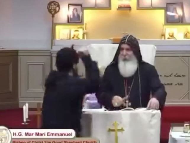 An attacker approaches Bishop Mar Mari Emmanuel during a church service at Christ The Good Shepherd Church in Wakeley, Sydney, Australia on April 15, 2024 in this still image from social media livestream video obtained by Reuters.