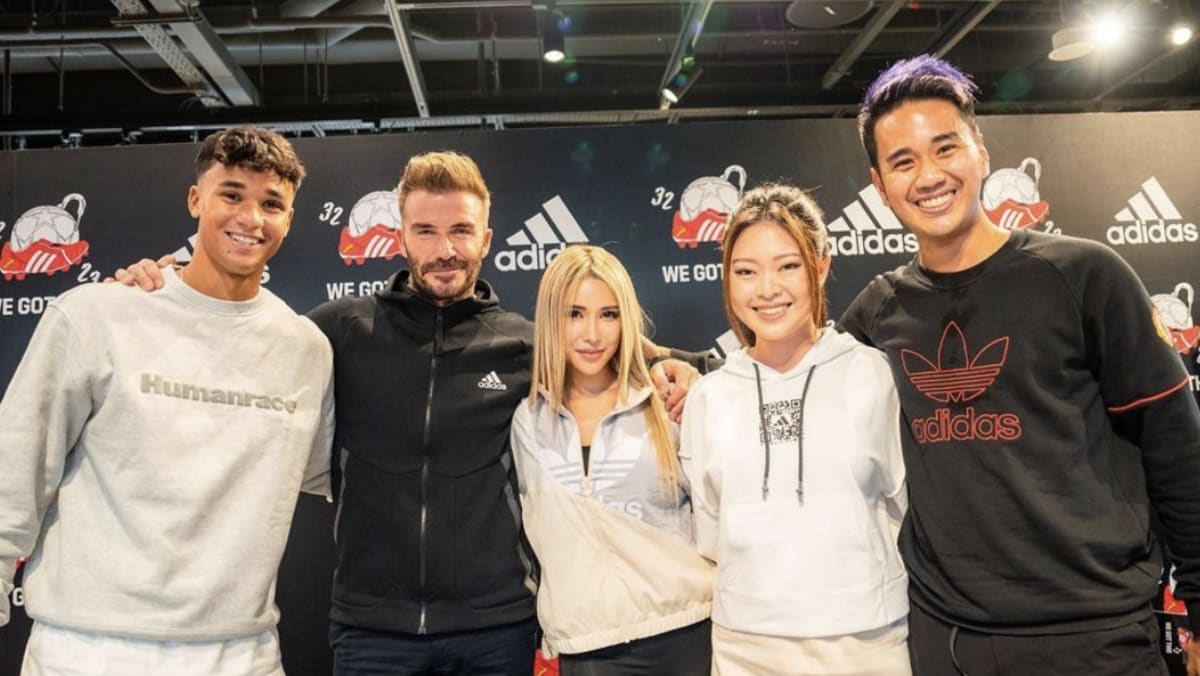 David Beckham spotted helping staff move furniture after Singapore