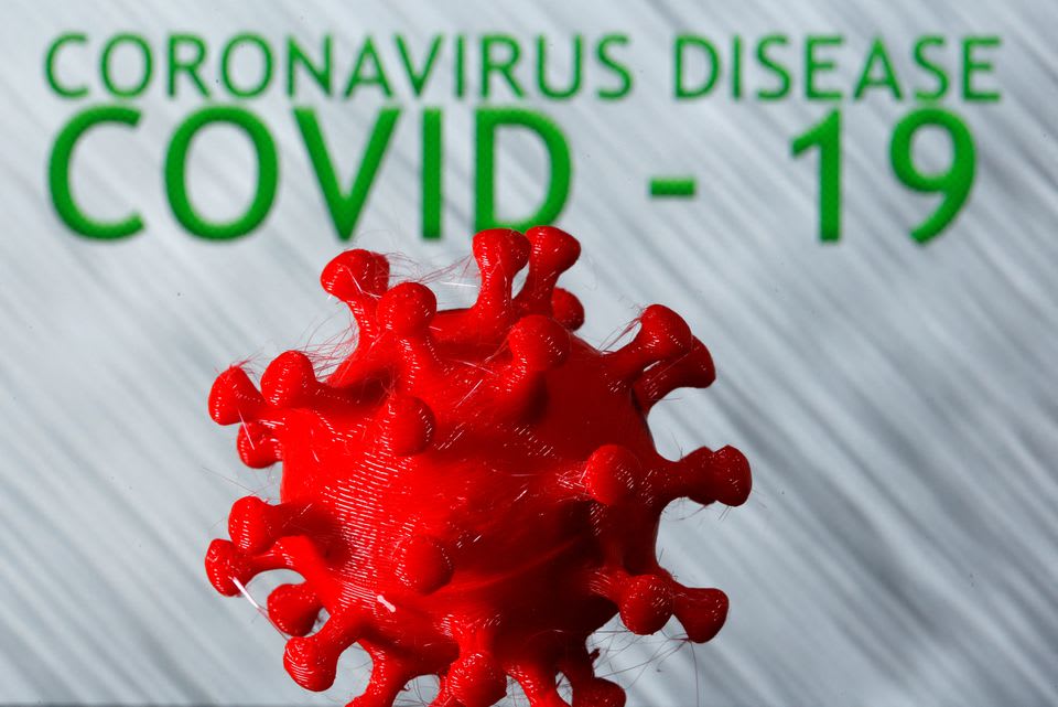 A 3D-printed coronavirus model is seen in front of the words coronavirus disease on display in this illustration taken on March 25, 2020.
A 3D-printed coronavirus model is seen in front of the words coronavirus disease on display in this illustration taken on March 25, 2020.
