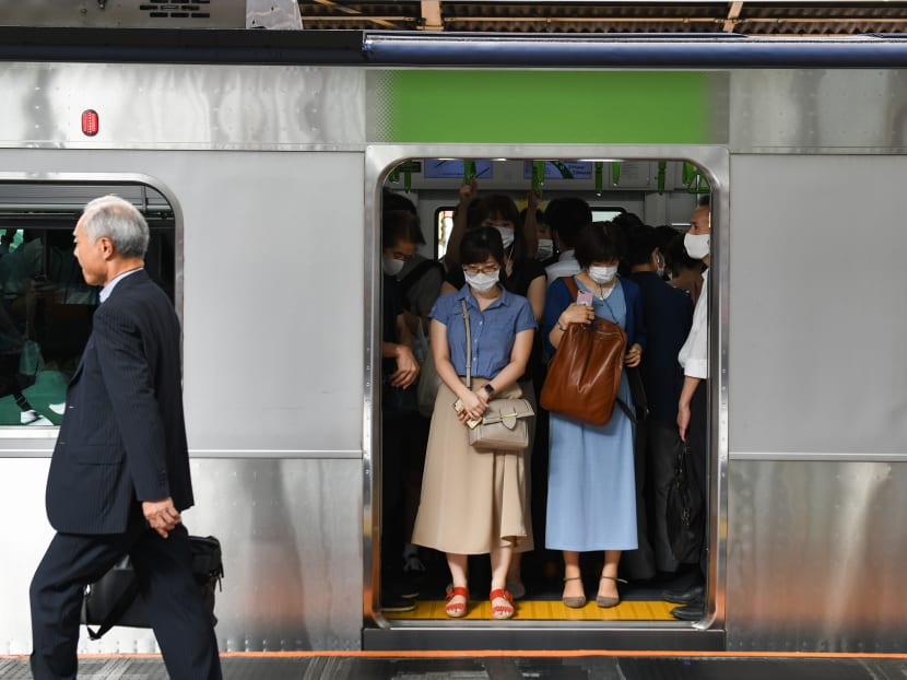 Commuters on train in the morning in Tokyo on Wednesday, Sept 9, 2020. Female workers remain largely shut out of management jobs in Japan, and many take part-time work because of overwhelming family responsibilities, despite policies that prime minister Shinzo Abe said would elevate their standing in society.