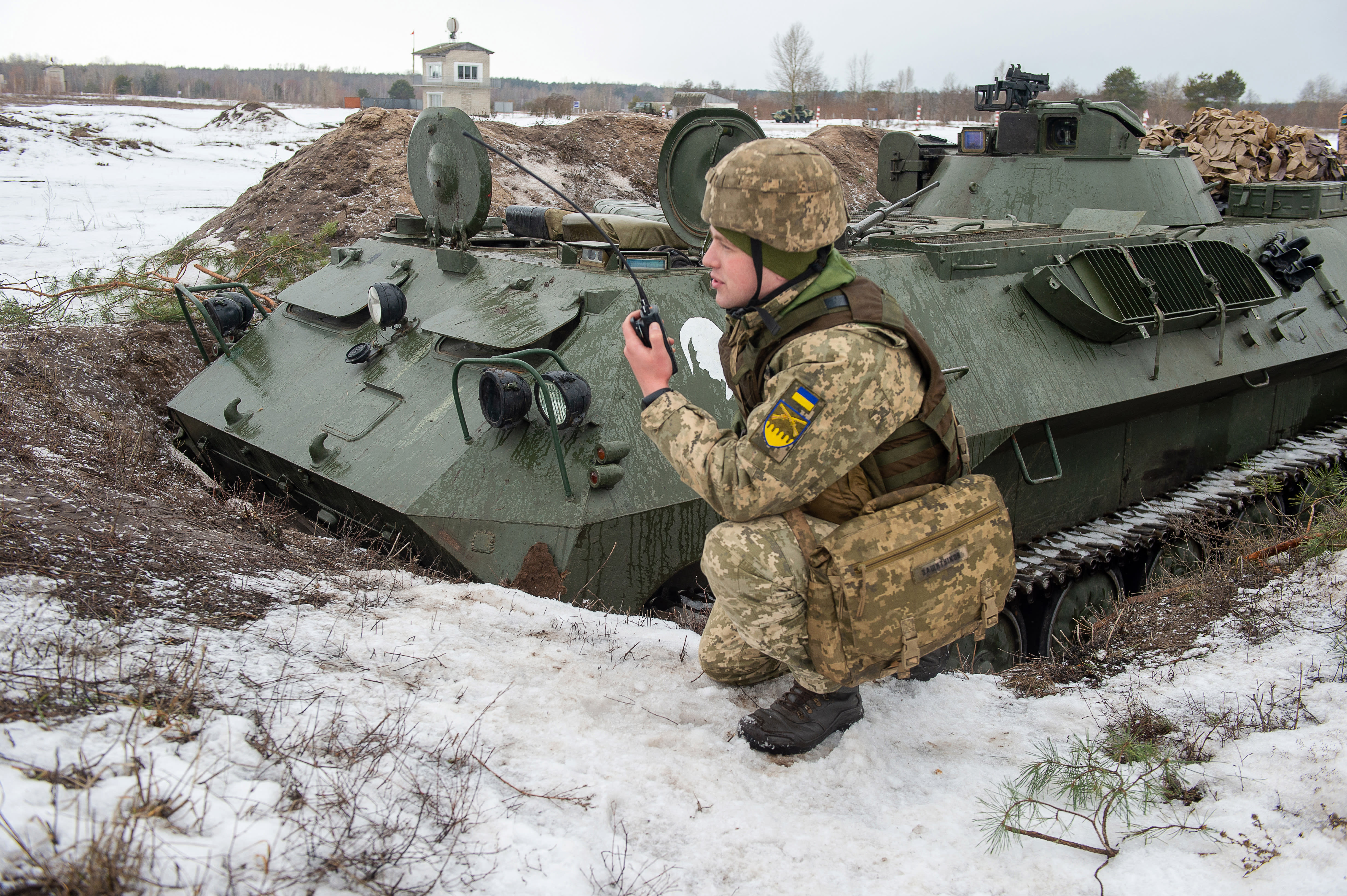 A Ukrainian Military Forces serviceman of the 92nd mechanised brigade takes part in live-fire exercises near the town of Chuguev, Kharkiv region on Feb 10, 2022.