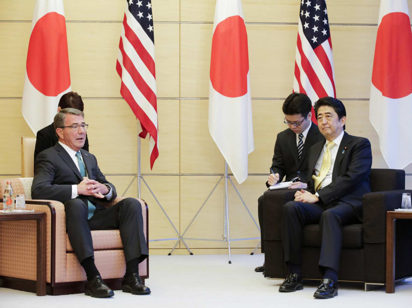 United States Defence Secretary Ashton Carter (left) met Japanese Prime Minister Shinzo Abe in Tokyo yesterday. Photo: EPA