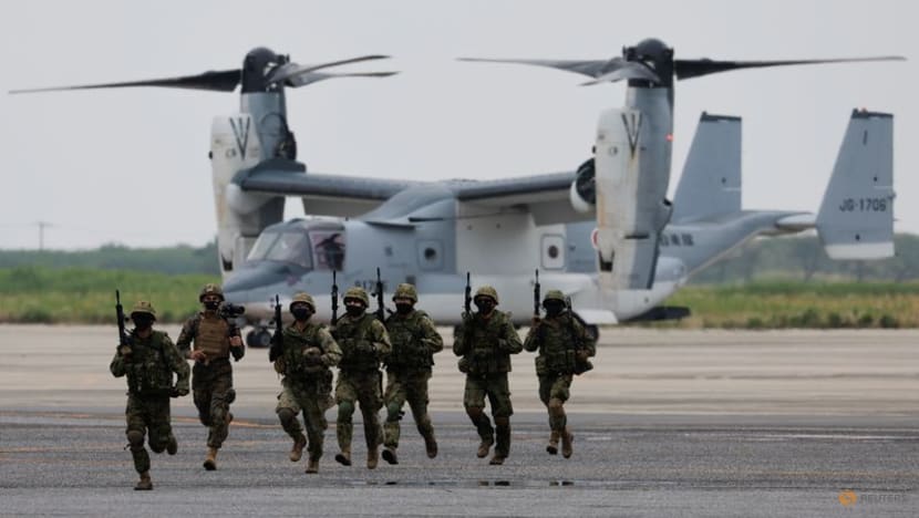 Japan unveils record budget in boost to military capacity Japan unveils record budget in boost to military capacity