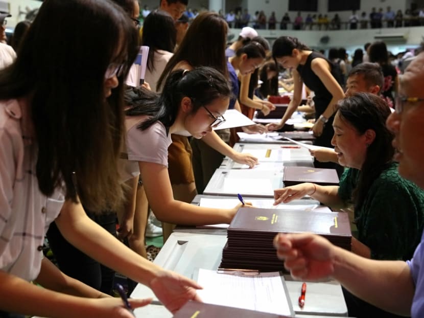 The collection of GCE A-Level results at Hwa Chong Institution on Feb 23, 2018.
