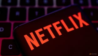Netflix slips after stopping subscriber tally report, downbeat Q2 revenue forecast