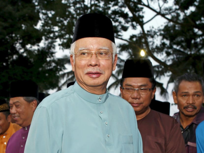 Malaysia’s Prime Minister Najib Razak arrives to break fast at Saujana Menteri Besar in Malaysia’s southern state of Johor July 3, 2015. Najib slammed a report on Friday that said close to $700 million was wired to his personal account from banks, government agencies and companies linked to the debt-laden state fund 1MDB, claiming this was a “continuation of political sabotage.” REUTERS/Edgar Su       TPX IMAGES OF THE DAY