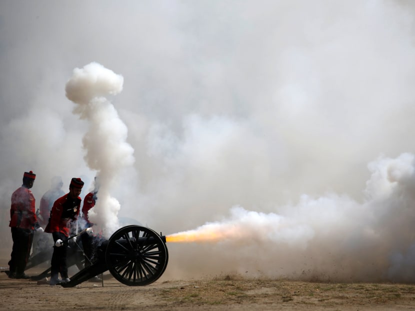 Members of the Nepalese army fire a cannon during the rehearsal for the upcoming Army Day celebration at Tundhikhel in Kathmandu, Nepal, on Feb 22, 2017. Photo: Reuters