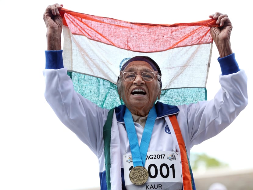 101-year-old Man Kaur from India celebrates after competing in the 100m sprint in the 100+ age category at the World Masters Games at Trusts Arena in Auckland on April 24, 2017. Photo: AFP