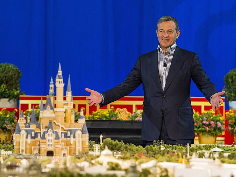 Disney Chairman and CEO, Mr Robert Iger with a mock up of the Shanghai Disney Resort. Photo: Disney Parks Blog