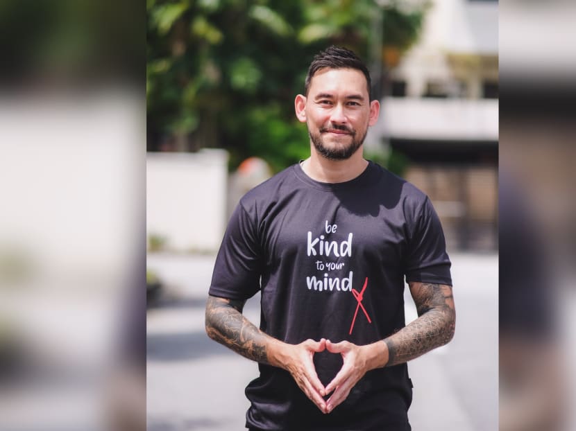 Actor Paul Foster wearing the T-shirt that the author, lawyer Nicholas Aw, initiated as a project to promote better mental health.