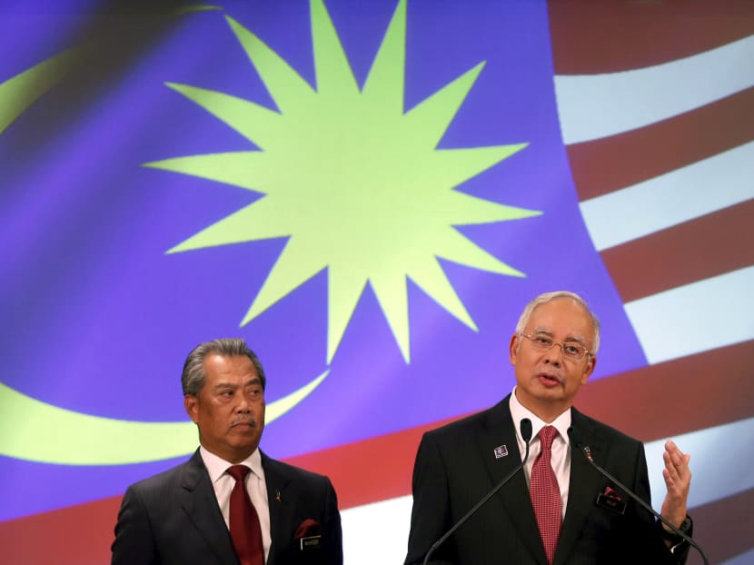 Mr Muhyiddin Yassin (left) with  Prime Minister Najib Razak in 2013. Reuters file photo