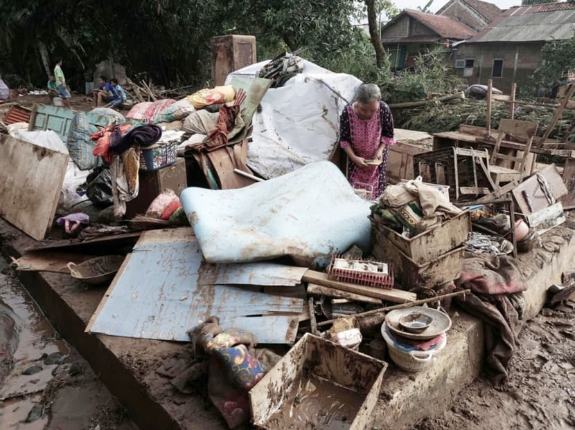 Gallery: Indonesian floods, landslides leave 35 dead, 25 missing