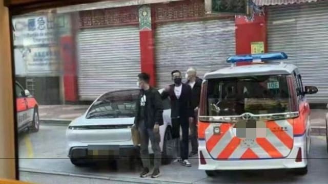 “洗米华”开跑车返公司助查 神情淡定未上铐