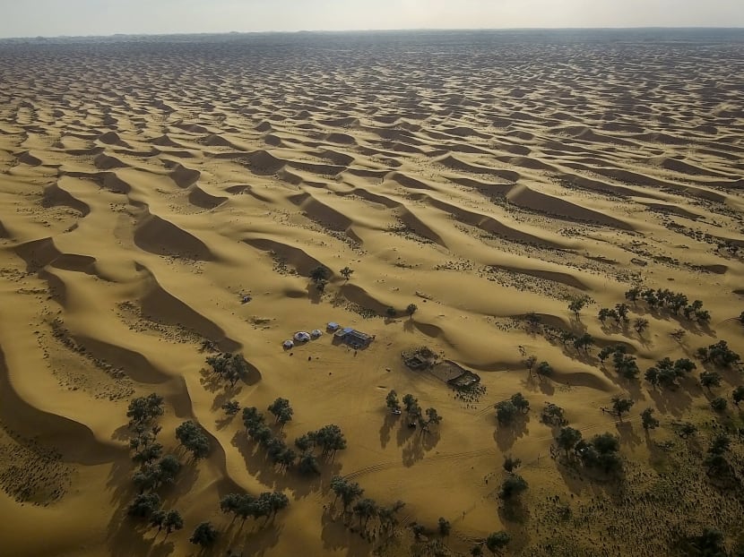 The Tengger Desert in Inner Mongolia, an autonomous region of China. Officials in northern China say their region is suffering from the worst drought on record, leading to crops wilting and farmers and herders growing desperate to get water to farmlands, grasslands, animals and their households. Photo: The New York Times