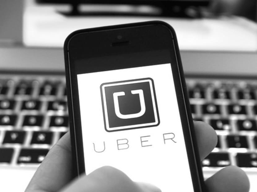 Uber argues that it does not own the cars or employ the drivers and, therefore, it is legally not subject to the regulations that apply to traditional taxi firms. Photo: Reuters