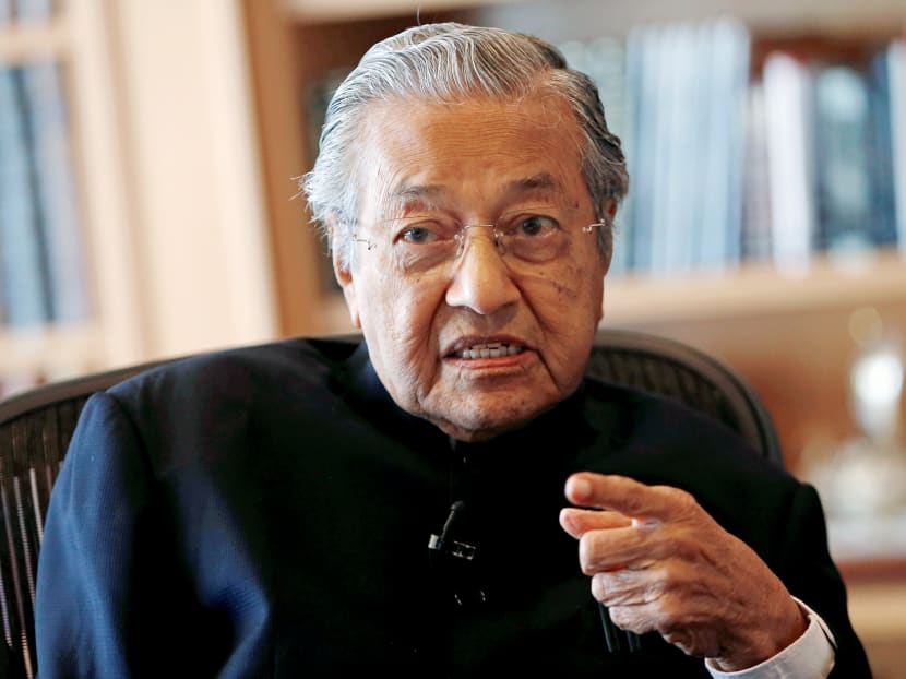 Dr Mahathir Mohamad says the disparate opposition coalition he has spearheaded to contest elections due by mid-2018 is tapping public anger at the corruption scandal and the rising cost of living. Photo: Reuters