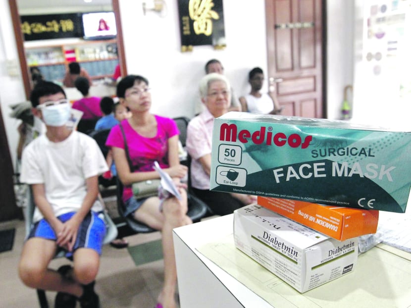 Efforts to distribute masks to low-income households have kicked in, but one challenge is educating those not keeping track of the news, says Chua Chu Kang GRC MP Alex Yam. Photo: Ernest Chua