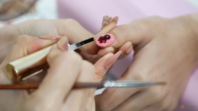 Malaysian salon paints Squid Game manicures of tiny coffins, green tracksuits