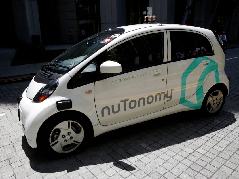 A nuTonomy self-driving taxi driving on the road in its public trial in Singapore on Aug 25, 2016. Photo: Reuters