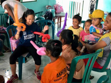 Child sponsor Soon Chuan Min interacts with World Vision beneficiaries in Ende, Indonesia. Photos: World Vision