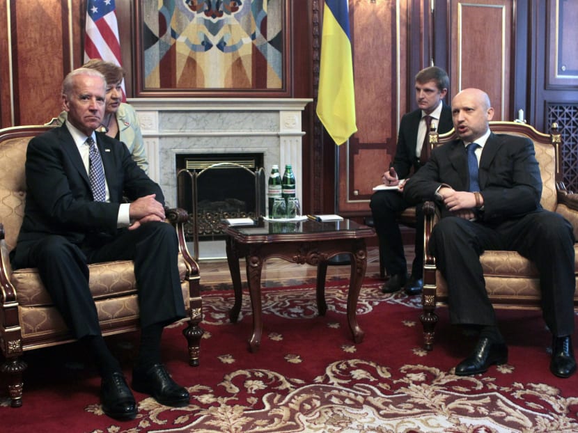 United States Vice President Joe Biden (left) sits with  acting Ukrainian President Oleksandr Turchynov during a meeting in Kiev, Ukraine, April 22, 2014. Photo: AP