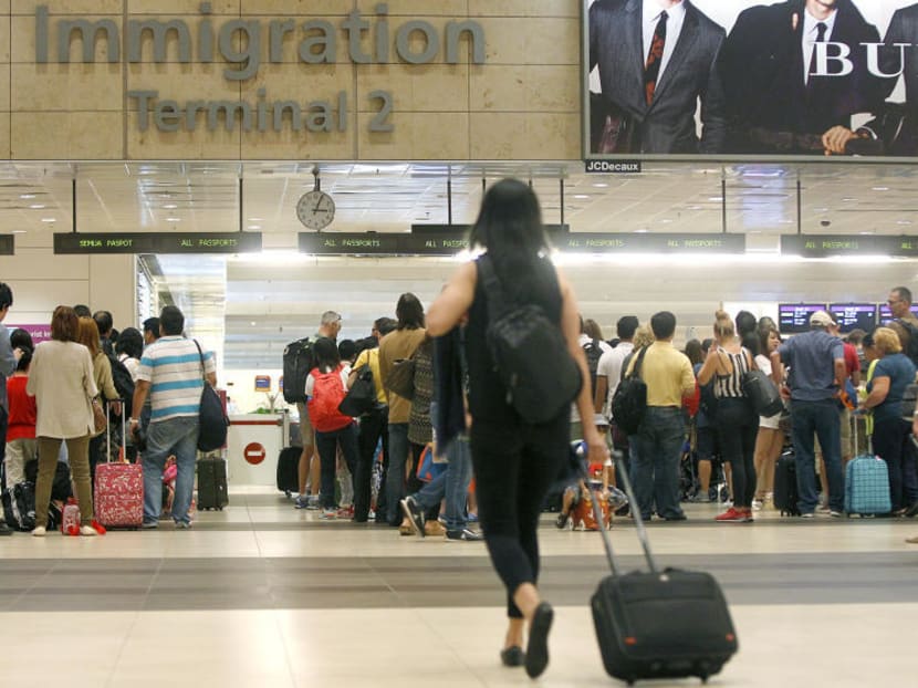Travellers arriving at the immigration hall at Changi Airport Terminal 2. TODAY file photo