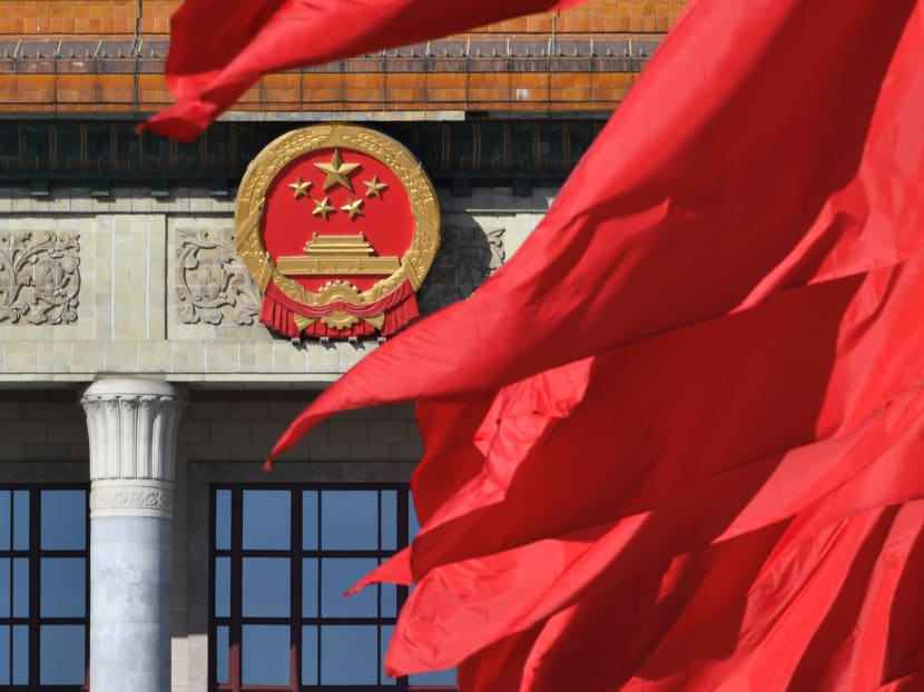 Photo of the day: Red flags flutter outside the Great Hall of the People during the closing session of the Chinese People's Political Consultative Conference in Beijing, China, March 13, 2019.