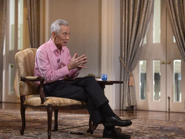 Prime Minister Lee Hsien Loong speaking to reporters during an interview on April 26, 2024. 