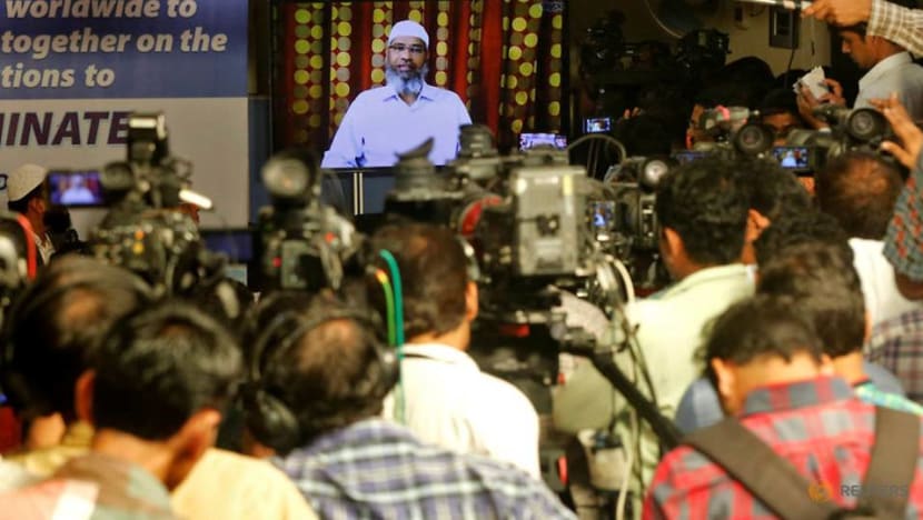 Malaysia quizzes Indian Islamic preacher Zakir Naik as pressure mounts Malaysia quizzes Indian Islamic preacher Zakir Naik as pressure mounts