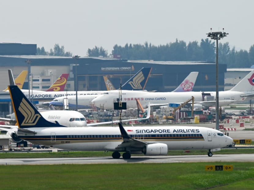 A Singapore Airlines plane plies along the tarmac of Singapore Changi Airport in Singapore on May 13, 2022.