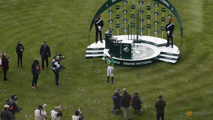 Horse racing-Blackmore makes history with Grand National win on Minella Times Horse racing-Blackmore makes history with Grand National win on Minella Times