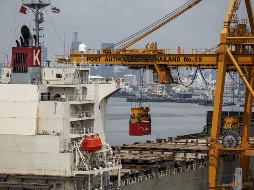 FILE PHOTO: A container is loaded onto a cargo ship at a port in Bangkok March 30, 2015. T REUTERS/Athit Perawongmetha/File Photo FILE PHOTO: A container is loaded onto a cargo ship at a port in Bangkok March 30, 2015. T REUTERS/Athit Perawongmetha/File Photo