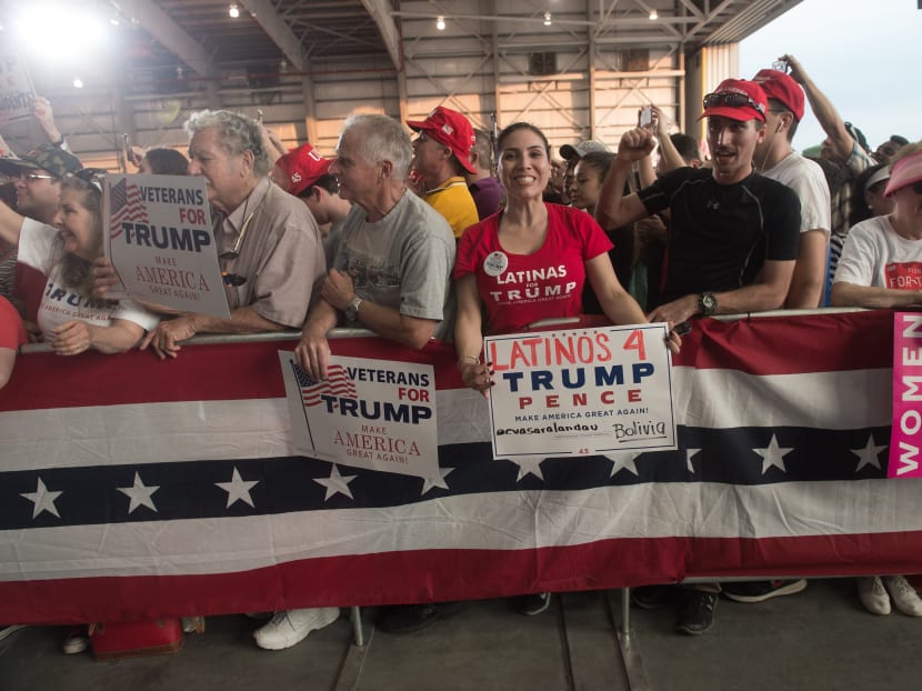 Trump supporters cheer US President Donald Trump during the rally in Florida. Photo: AFP