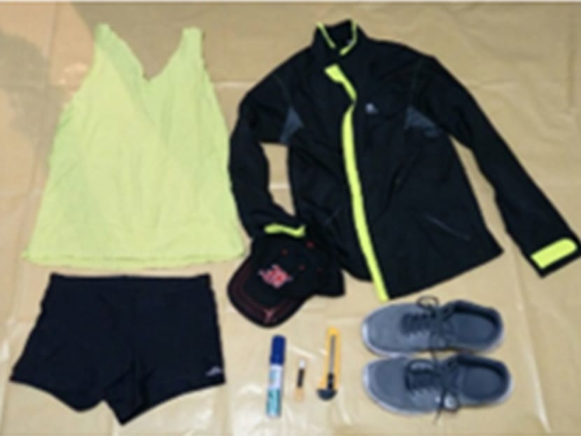 Some clothing and a marker seized from the suspect. Photo: Singapore Police Force