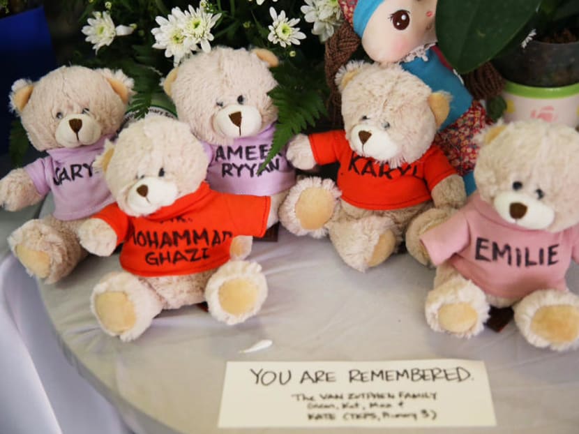 A collection of plush toy teddies with the name of the Sabah quake victims seen at the tribute centre at Tanjong Katong Primary School.