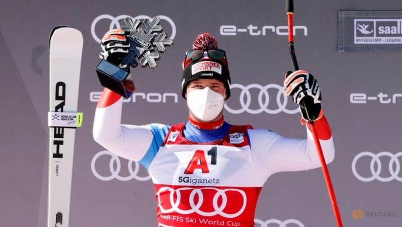 Alpine skiing: Weather hands World Cup downhill titles to Feuz and Goggia Alpine skiing: Weather hands World Cup downhill titles to Feuz and Goggia