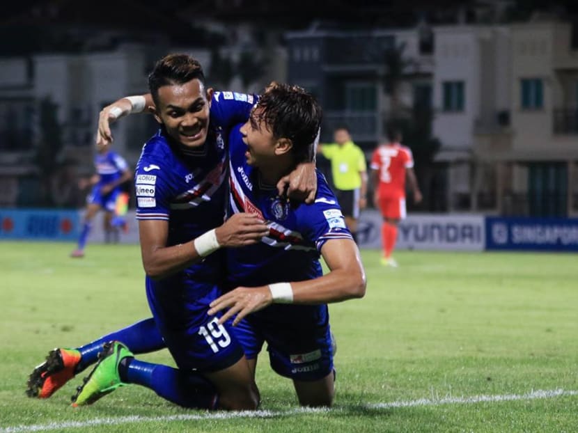 Warriors FC striker Shahril Ishak (right) celebrating one of his goals against Home United. Photo: S.League