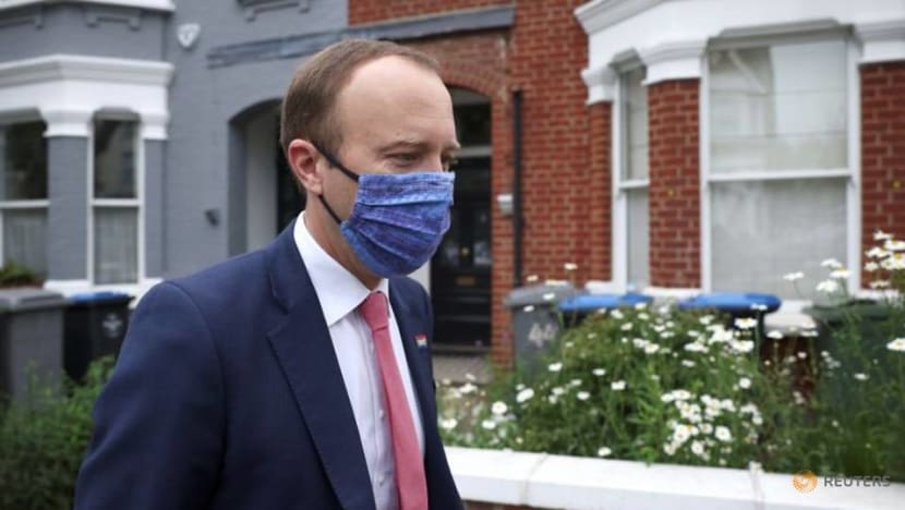 UK health minister pictured kissing aide; opposition wants appointment 'looked into' UK health minister pictured kissing aide; opposition wants appointment 'looked into'