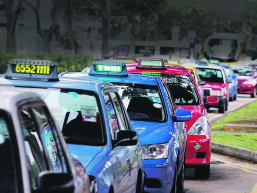 Taxis in Singapore on Sept 17, 2013. TODAY file photo