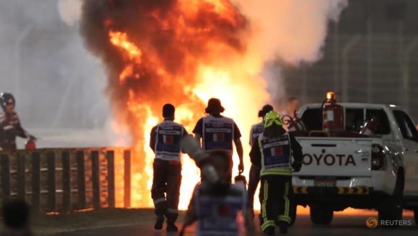 Formula One: Romain Grosjean escapes horrific first lap crash in Bahrain Grand Prix Formula One: Romain Grosjean escapes horrific first lap crash in Bahrain Grand Prix