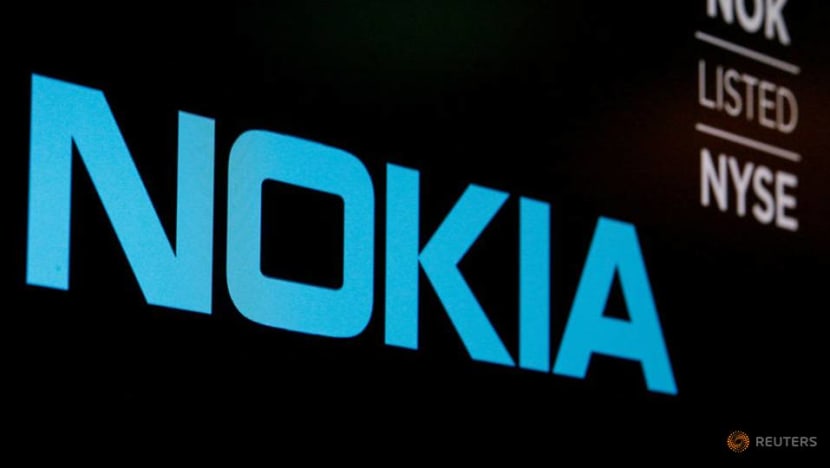 Nokia shares plunge 20% on lower earnings forecast