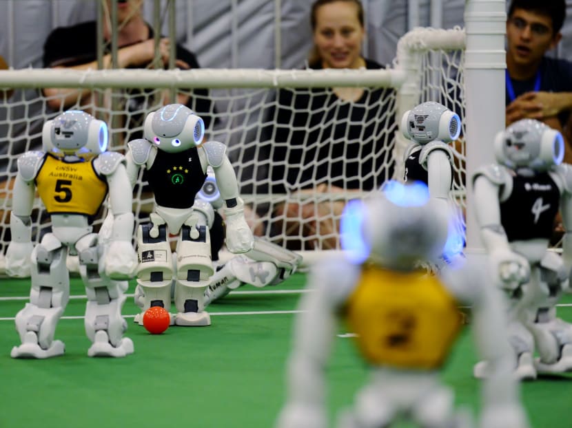 Robots take to the pitch at the 2015 Robocup in China. Photo: AFP