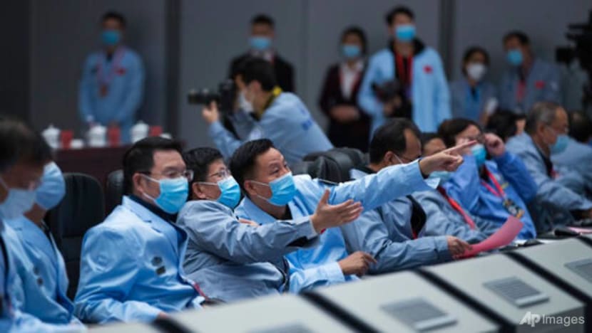 Chinese probe orbiting moon with Earth-bound samples Chinese probe orbiting moon with Earth-bound samples
