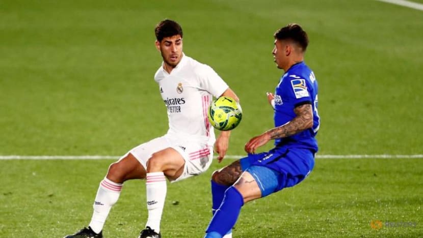 Football: Exhausted Real lose momentum in title race with draw at Getafe Football: Exhausted Real lose momentum in title race with draw at Getafe