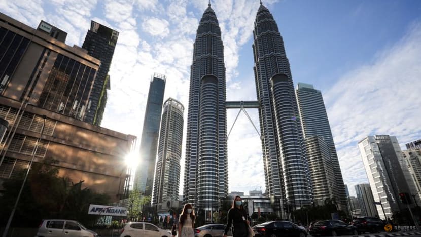 Malaysian economy swings back to growth as pandemic curbs ease